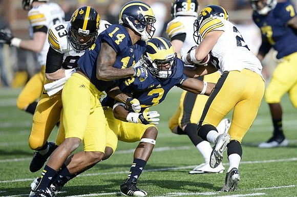 Josh Furman (14), Marvin Robinson (3), and Brandin Hawthorne (7)