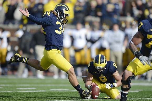 Brendan Gibbons (34), Drew Dileo (9), and Taylor Lewan (77)