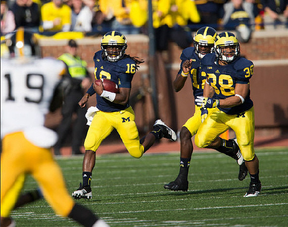 Denard Robinson (16), Devin Gardner (12), and Thomas Rawls (38)