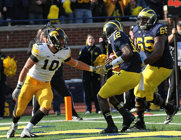 Devin Gardner (12) and Patrick Omameh (65)
