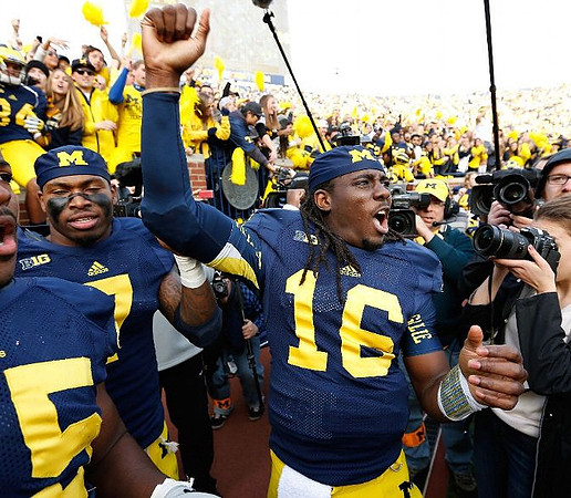 Brandin Hawthorne (7) and Denard Robinson (16)