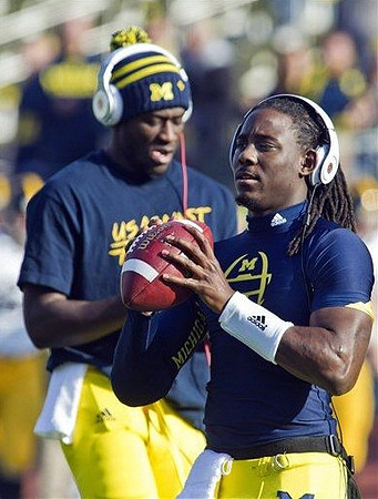 Devin Gardner (12) and Denard Robinson (16)