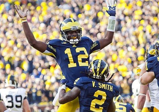 Devin Gardner (12) and Vincent Smith (2)