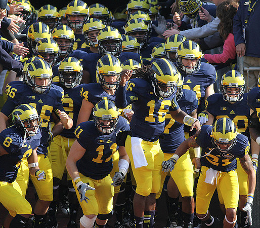 J.T. Floyd (8), Seth Broekhuizen (46), Jordan Kovacs (11), Denard Robinson (16), and Roy Roundtree (21)