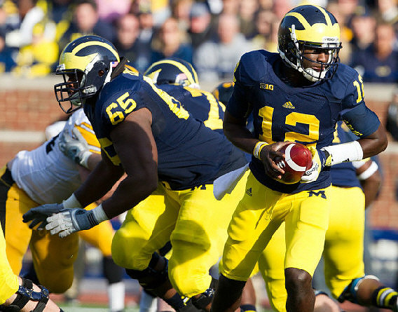 Patrick Omameh (65) and Devin Gardner (12)