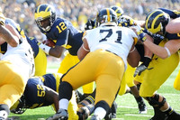 Ricky Barnum (52) and Devin Gardner (12)