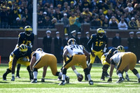 Devin Gardner (12), Denard Robinson (16), Patrick Omameh (65), Elliott Mealer (57), and Ricky Barnum (52)