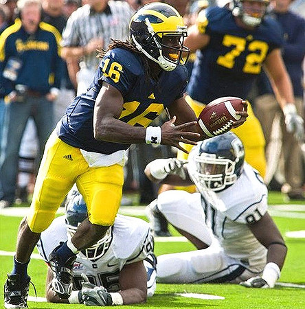 Denard Robinson (16) and Mark Huyge (72)