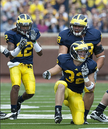 J.T. Floyd (12), Jordan Kovacs (32), and Craig Roh (88)