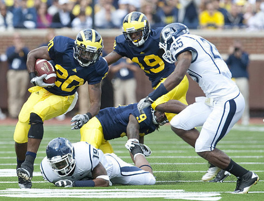 Michael Shaw (20), Martavious Odoms (9), and Kelvin Grady (19)