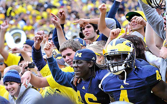 Denard Robinson (16) and Cameron Gordon (4)