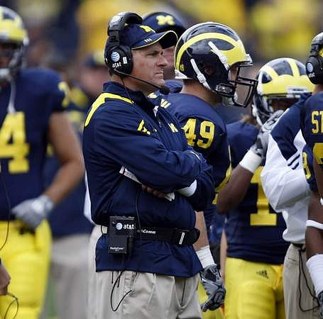 Rich Rodriguez and John McColgan (49)