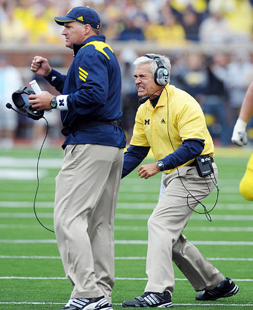 Rich Rodriguez and Greg Robinson