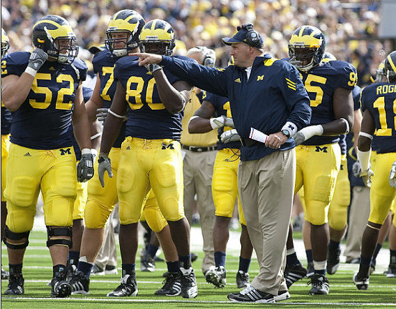 Stephen Schilling (52), Martell Webb (80), Rich Rodriguez, Renaldo Sagesse (95), and James Rogers (18)