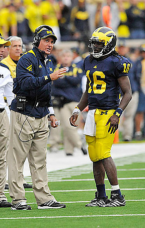 Rich Rodriguez and Denard Robinson (16)