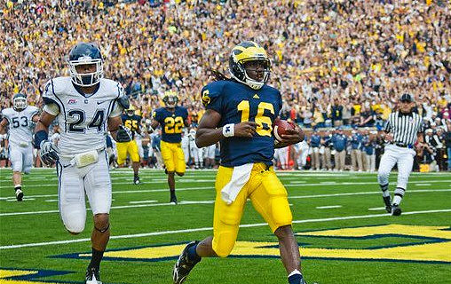 Denard Robinson (16), Darryl Stonum (22), and Patrick Omameh (65)