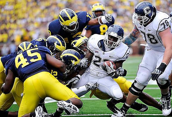 Obi Ezeh (45), J.T. Floyd (12), Carvin Johnson (13), and Jonas Mouton (8)