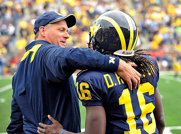 Rich Rodriguez and Denard Robinson (16)
