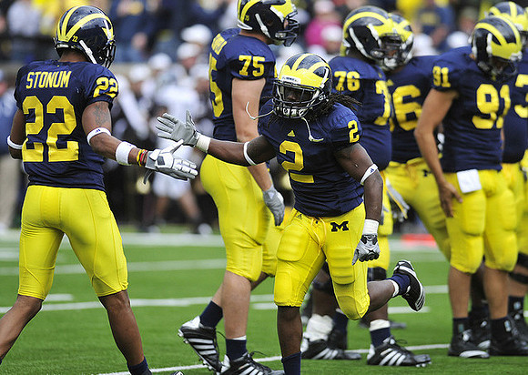 Darryl Stonum (22), Vincent Smith (2), Michael Schofield (75), Quinton Washington (76), and Tom Pomarico (91)
