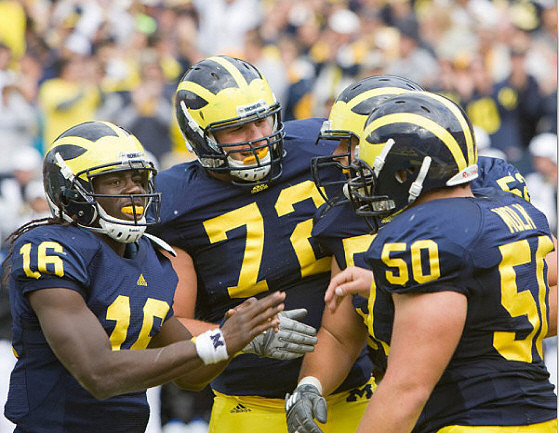 Denard Robinson (16), Mark Huyge (72), Stephen Schilling (52), and David Molk (50)