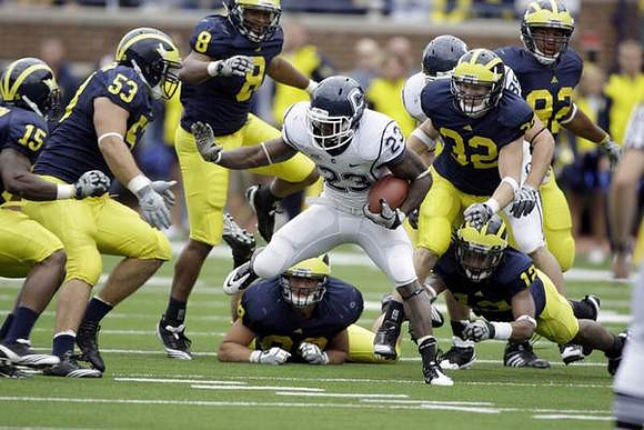 Thomas Gordon (15), Ryan Van Bergen (53), Jonas Mouton (8), Craig Roh (88), Jordan Kovacs (32), J.T. Floyd (12), and Greg Banks (92)