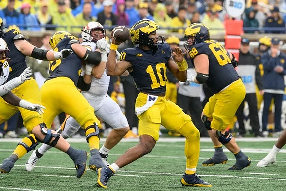 Alex Orji (10) and Josh Priebe (68)