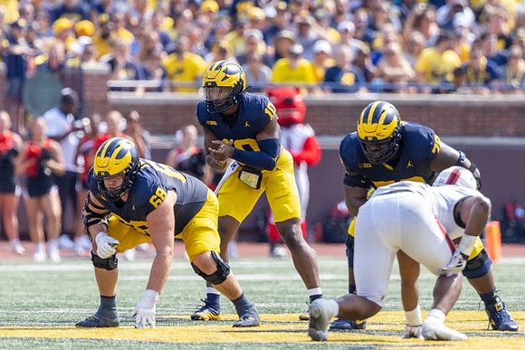 Josh Priebe (68), Alex Orji (10), and Myles Hinton (78)