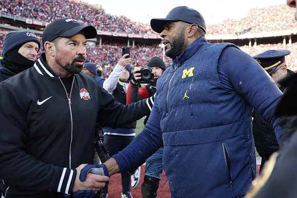 Ohio State Head Coach Ryan Day and Sherrone Moore