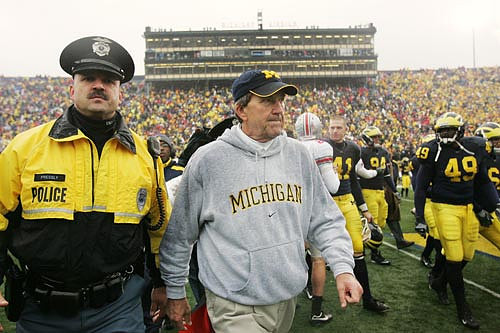 Lloyd Carr, Zoltan Mesko, and John Thompson