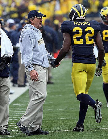 Lloyd Carr and Jamar Adams