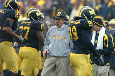 Shawn Crable, Terrance Taylor, Adam Patterson, and Lloyd Carr