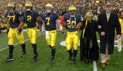 Jake Long, Shawn Crable, Chad Henne and Michael Hart, Cathy Schembechler, and Bill Martin