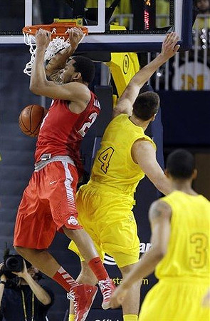 Mitch McGary (4) and Trey Burke (3)