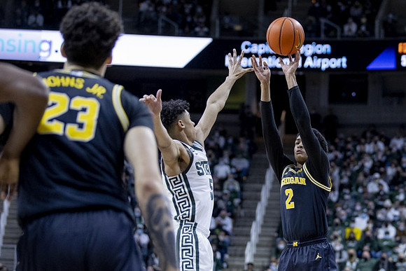 Brandon Johns Jr. (23) and Kobe Bufkin (2)