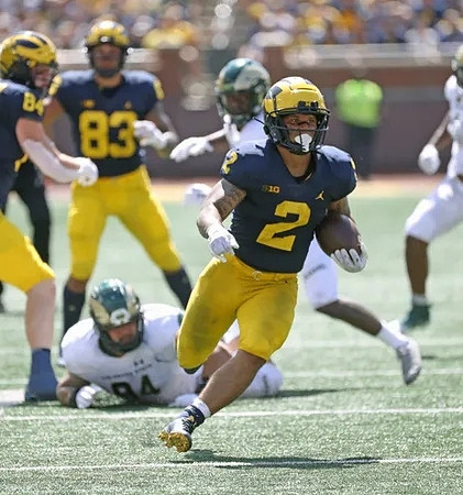 Joel Honigford (84), Erick All (83), and Blake Corum (2)