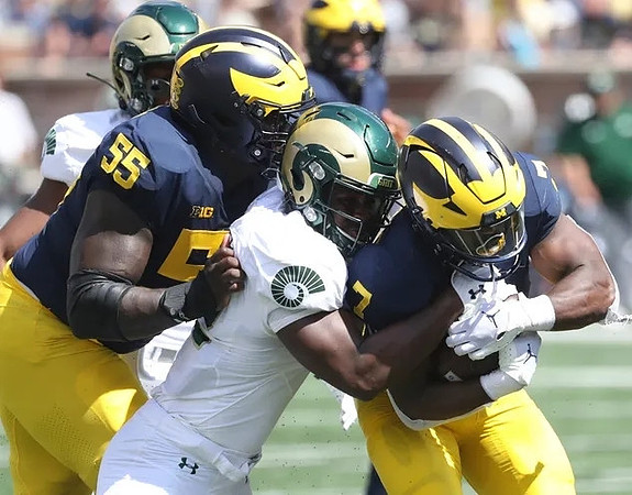 Olusegun Oluwatimi (55) and Donovan Edwards (7)