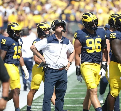 Jim Harbaugh and Michigan Team