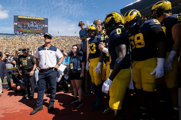 Jim Harbaugh and Michigan Team