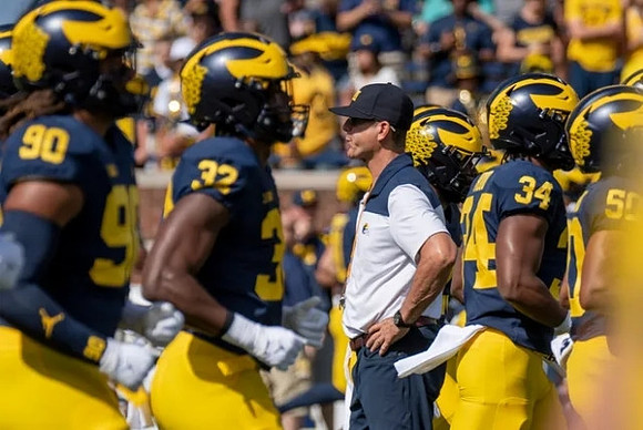 Jim Harbaugh and Michigan Team
