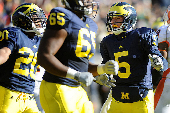 Michael Shaw (20), Patrick Omameh (65), and Tate Forcier (5)