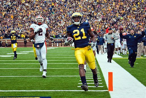 Denard Robinson (16) and Junior Hemingway (21)