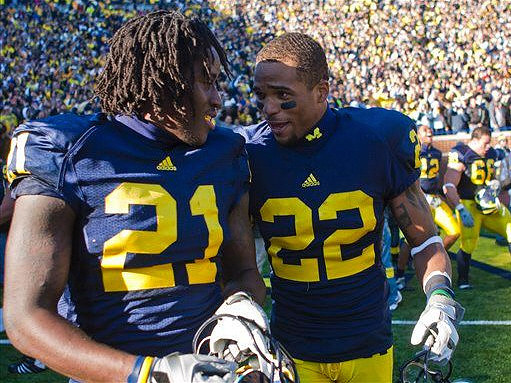 Junior Hemingway (21), Darryl Stonum (22), and Mike Martin (68)