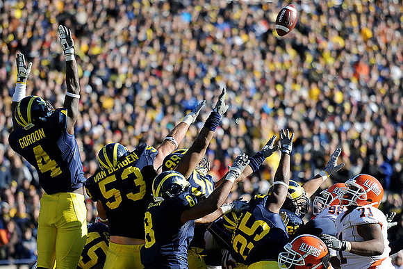 Cameron Gordon (4), Ryan Van Bergen (53), Adam Patterson (99), Jonas Mouton (8), and Kenny Demens (25)