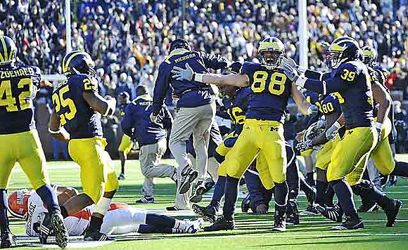 J.B. Fitzgerald (42), Kenny Demens (25), Denard Robinson (16), Craig Roh (88), Martell Webb (80), and Will Heininger (39)