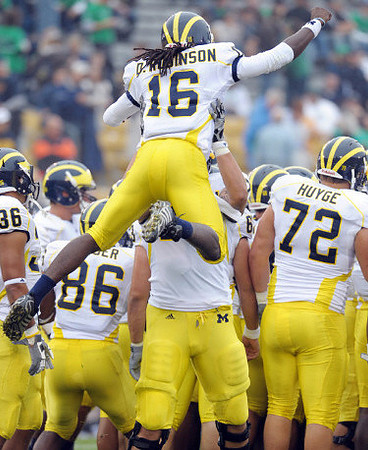Kevin Koger (86), Denard Robinson (16), and Mark Huyge (72)