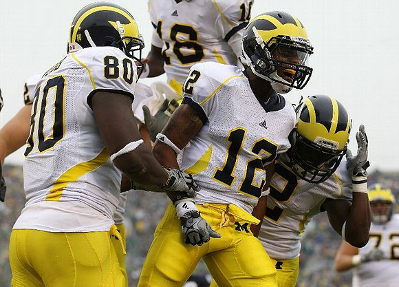 Martell Webb (80), Roy Roundtree (12), Denard Robinson (16), Vincent Smith (2), and Mark Huyge (72)