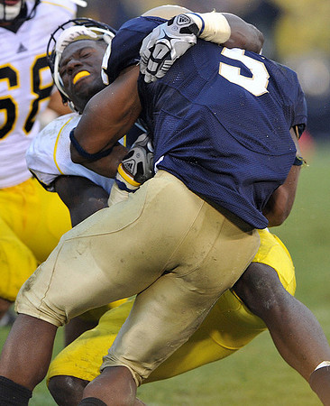 Cameron Gordon (4) and Mike Martin (68)