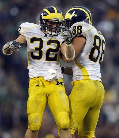 Jordan Kovacs (32) and Craig Roh (88)