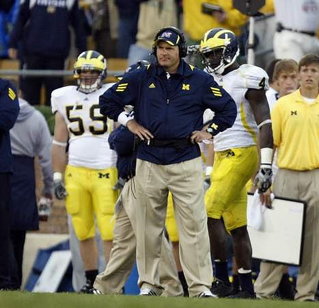 Paul Gyarmati (59), Rich Rodriguez, and Cameron Gordon (4)