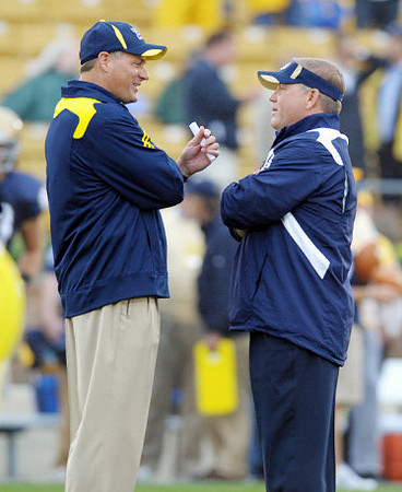Rich Rodriguez and Brian Kelly